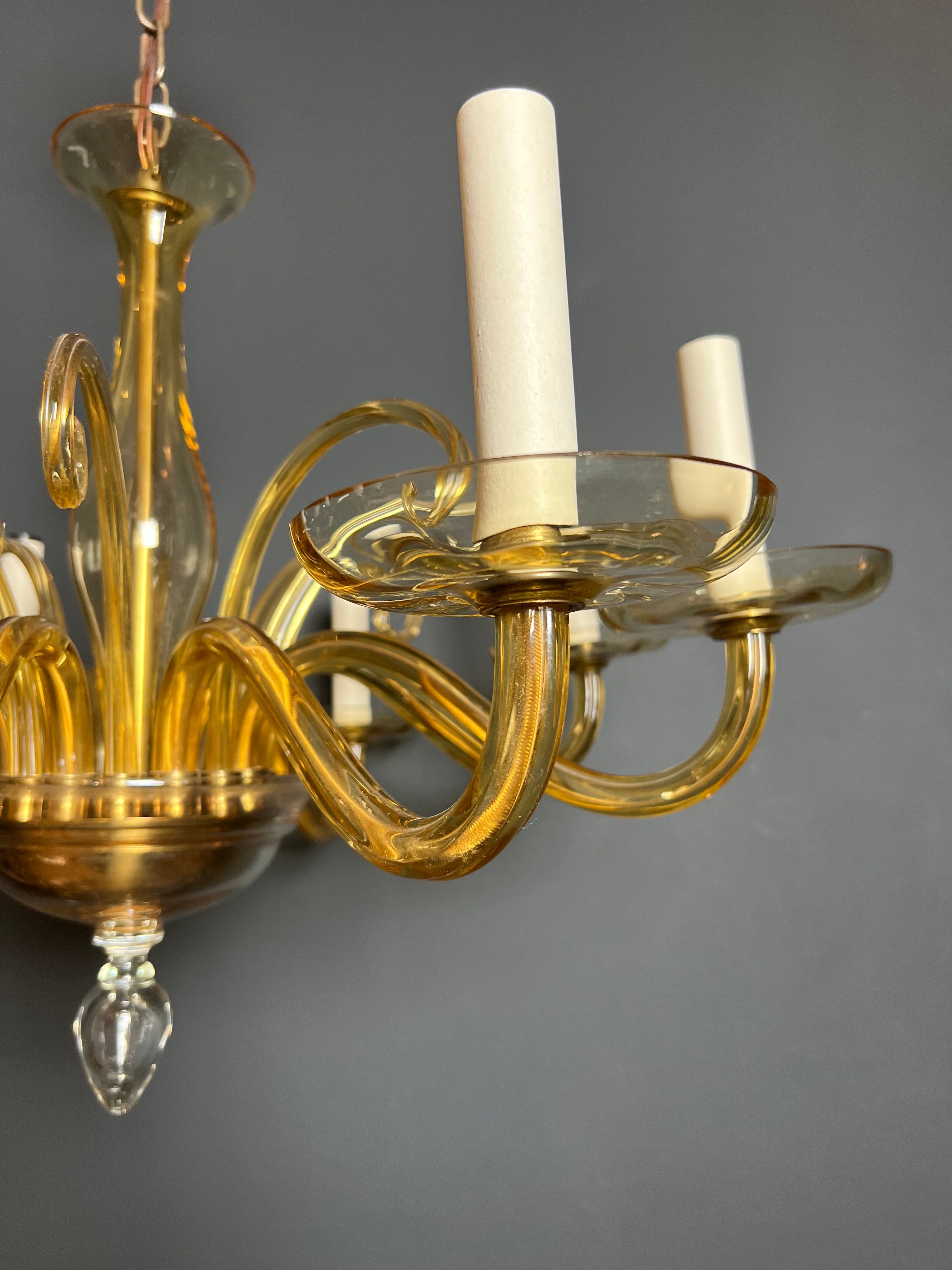 Orange Murano crystal chandelier with 8 light arms. Italian work. Circa 1970.