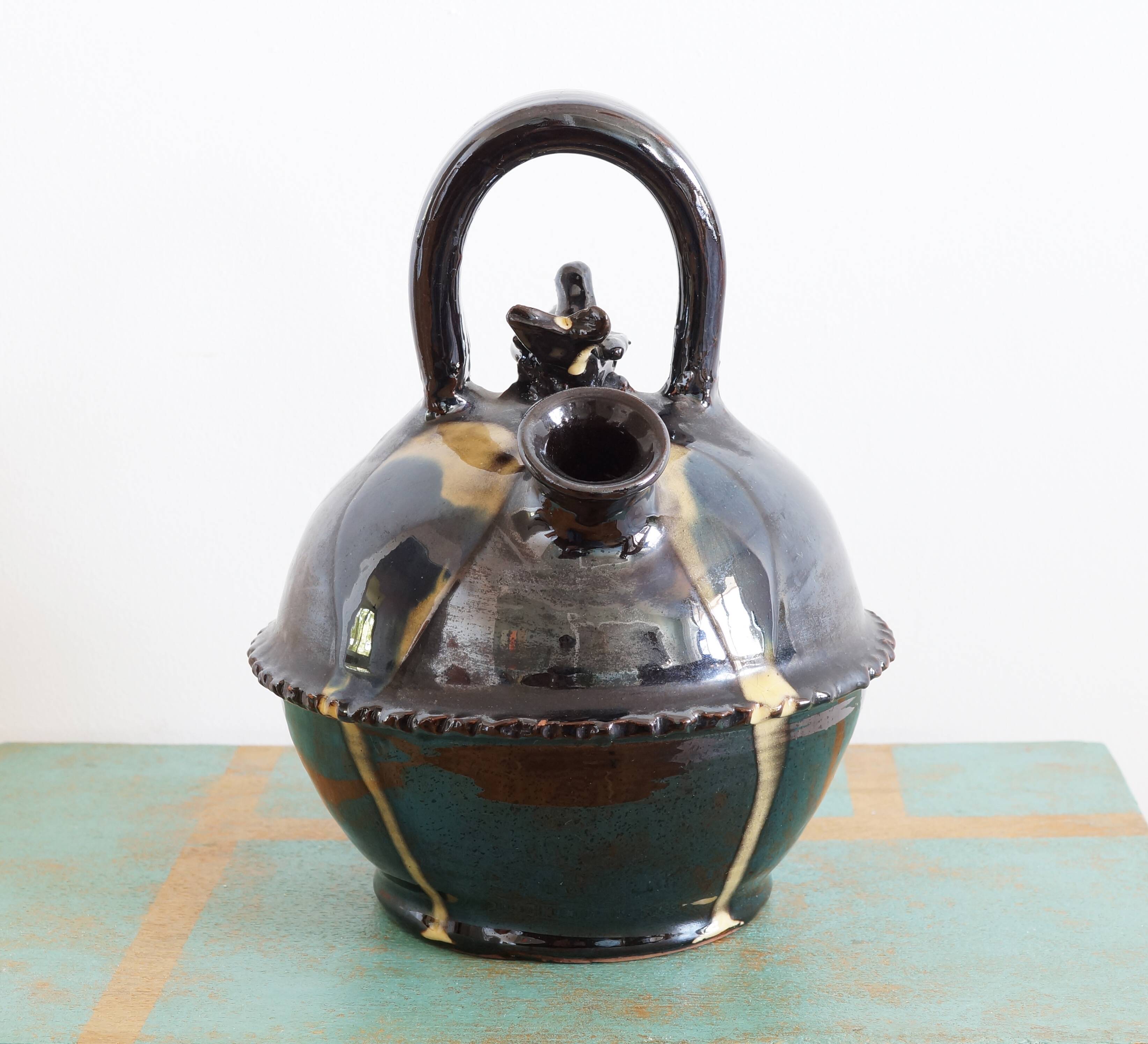 Glazed terracotta gargoulette with bird decoration