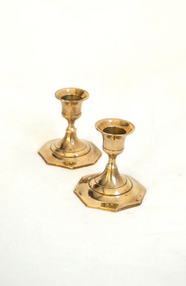 Duo of brass candle holders