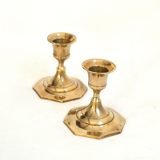 Duo of brass candle holders