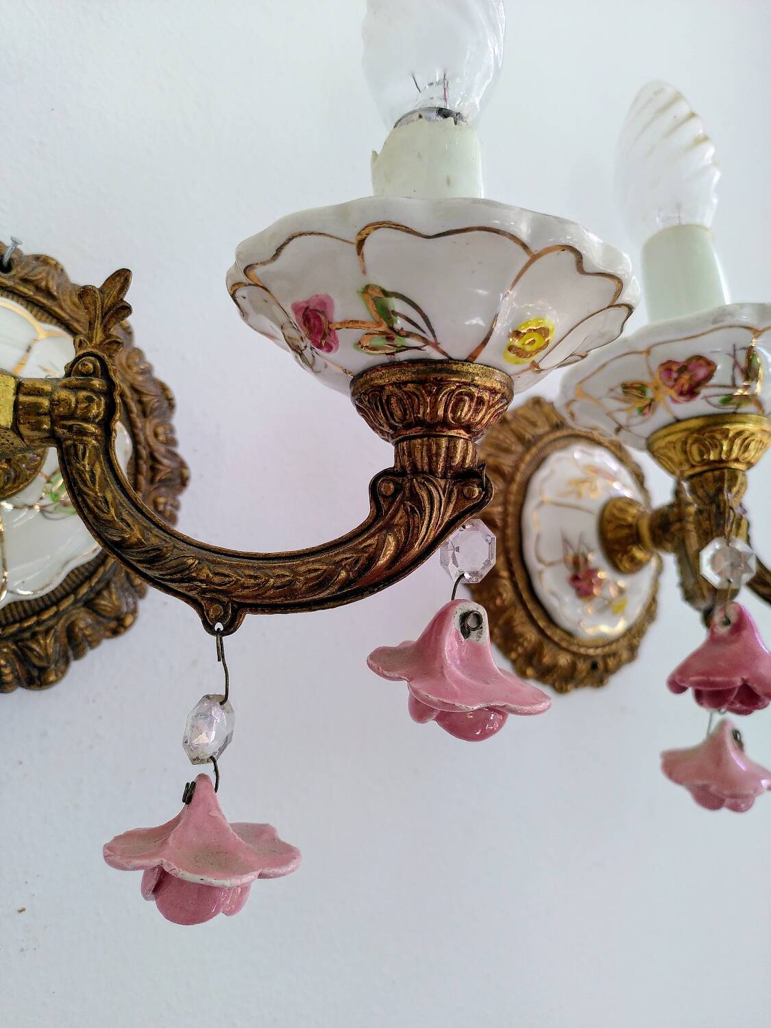 Pair of brass and porcelain wall lights