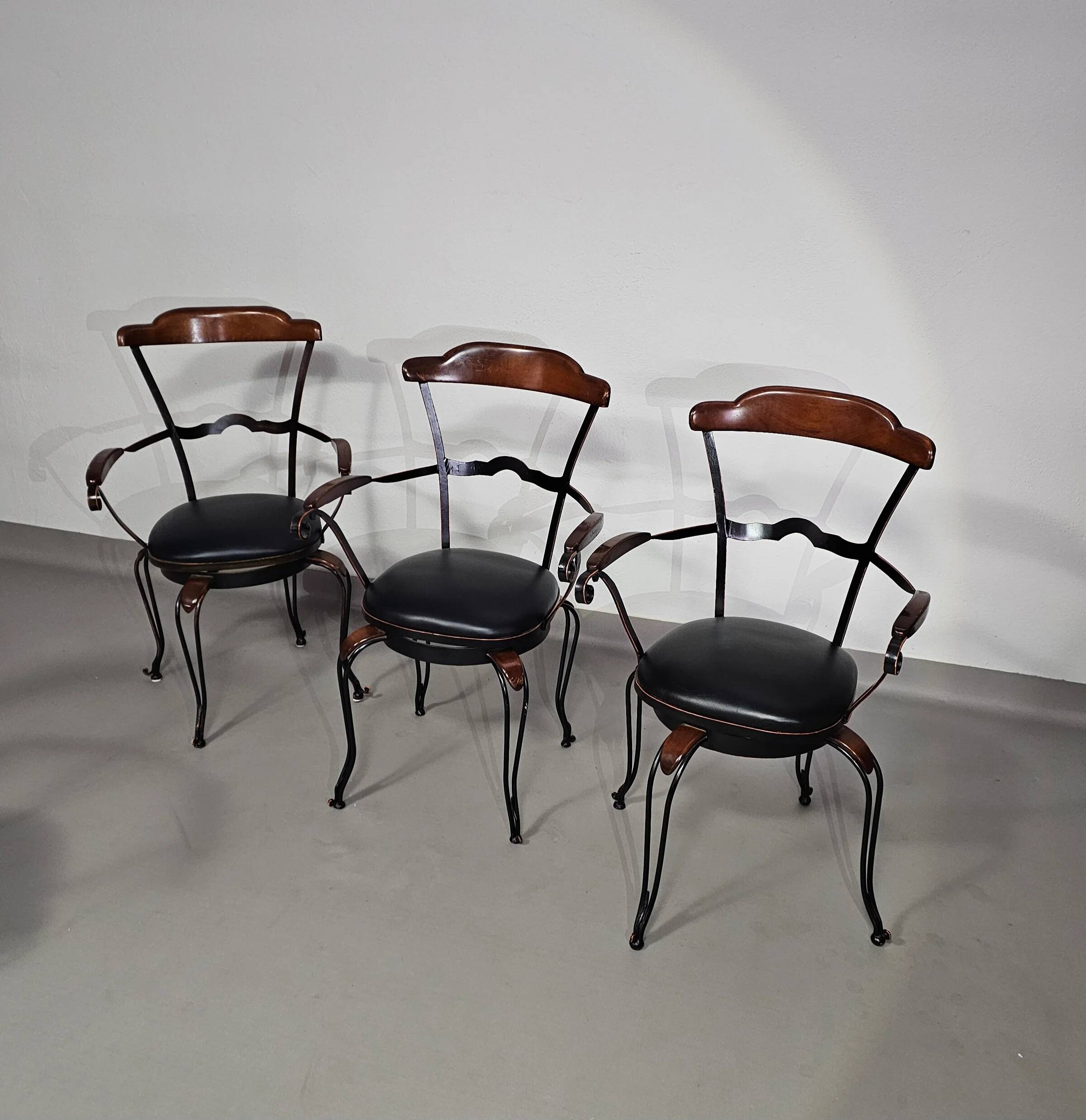 Italian postmodern turnable wrought iron dining chairs with leather seats