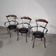 Italian postmodern turnable wrought iron dining chairs with leather seats