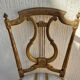 Paire de chaises à dossier lyre doré