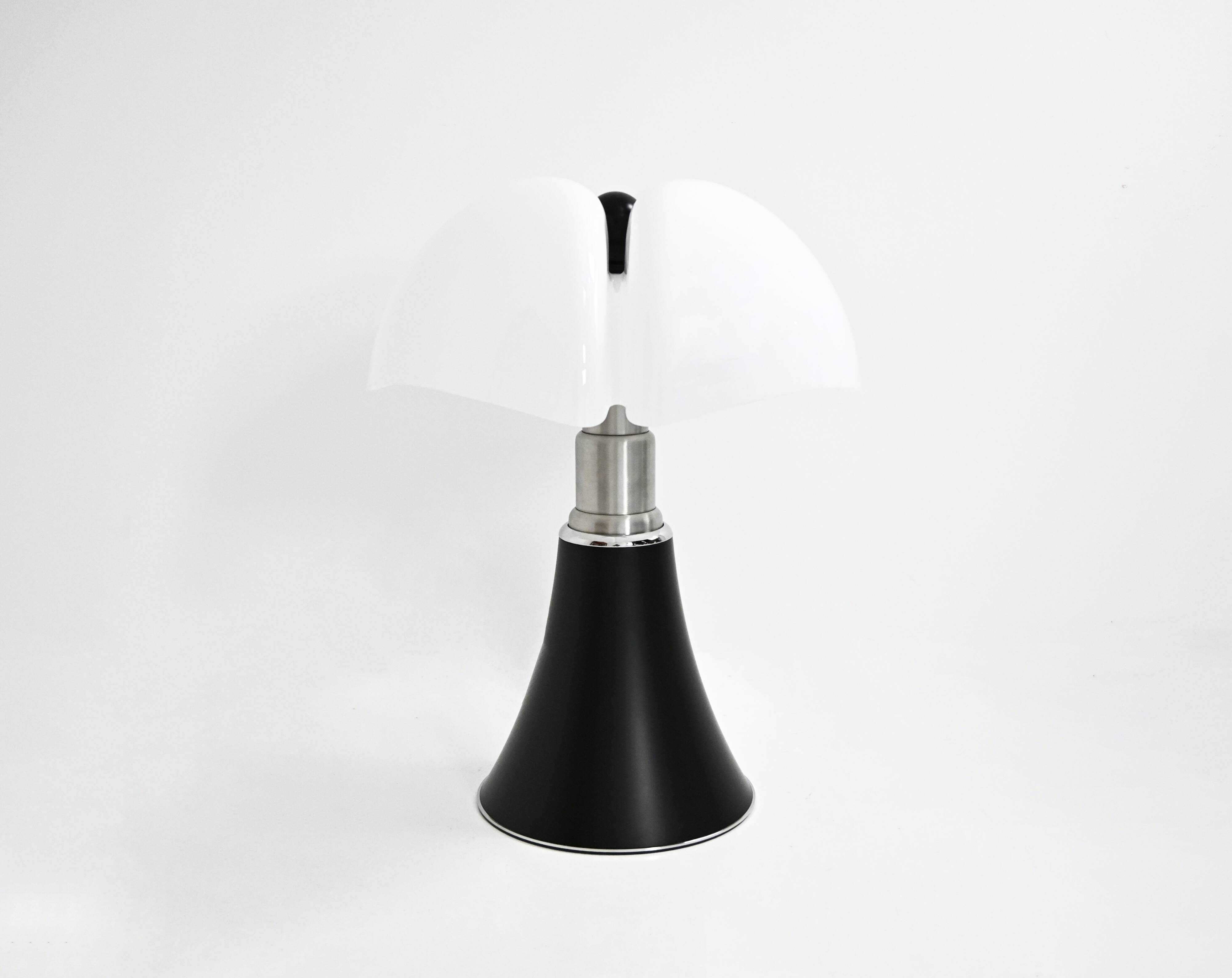 Black "Pipistrello" table lamp by Gae Aulenti for Martinelli.
