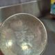 Footed glass in pewter