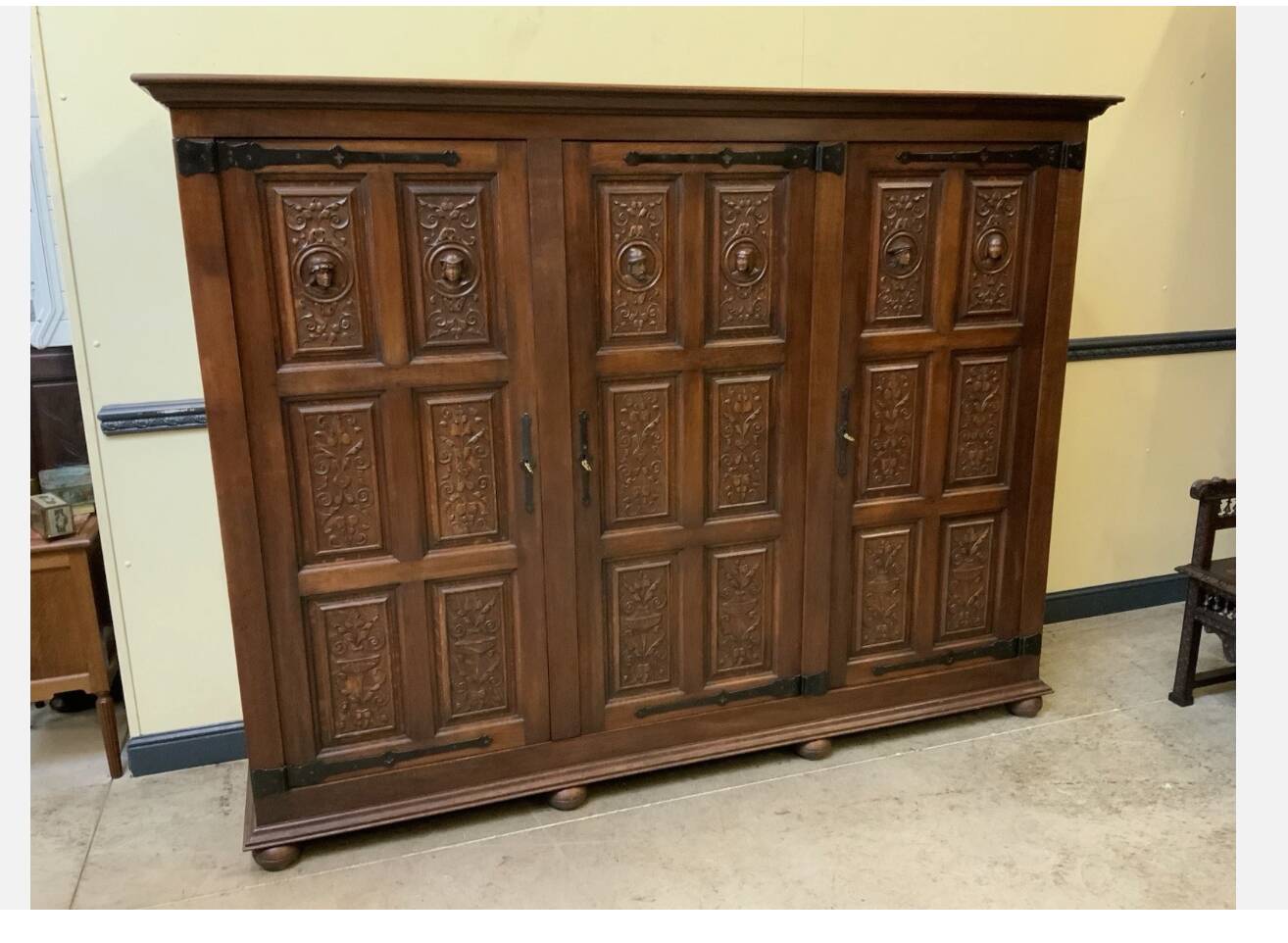Antique neo-Gothic wardrobe with linen drawers.