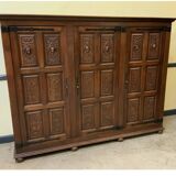 Antique neo-Gothic wardrobe with linen drawers.