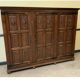 Antique neo-Gothic wardrobe with linen drawers.