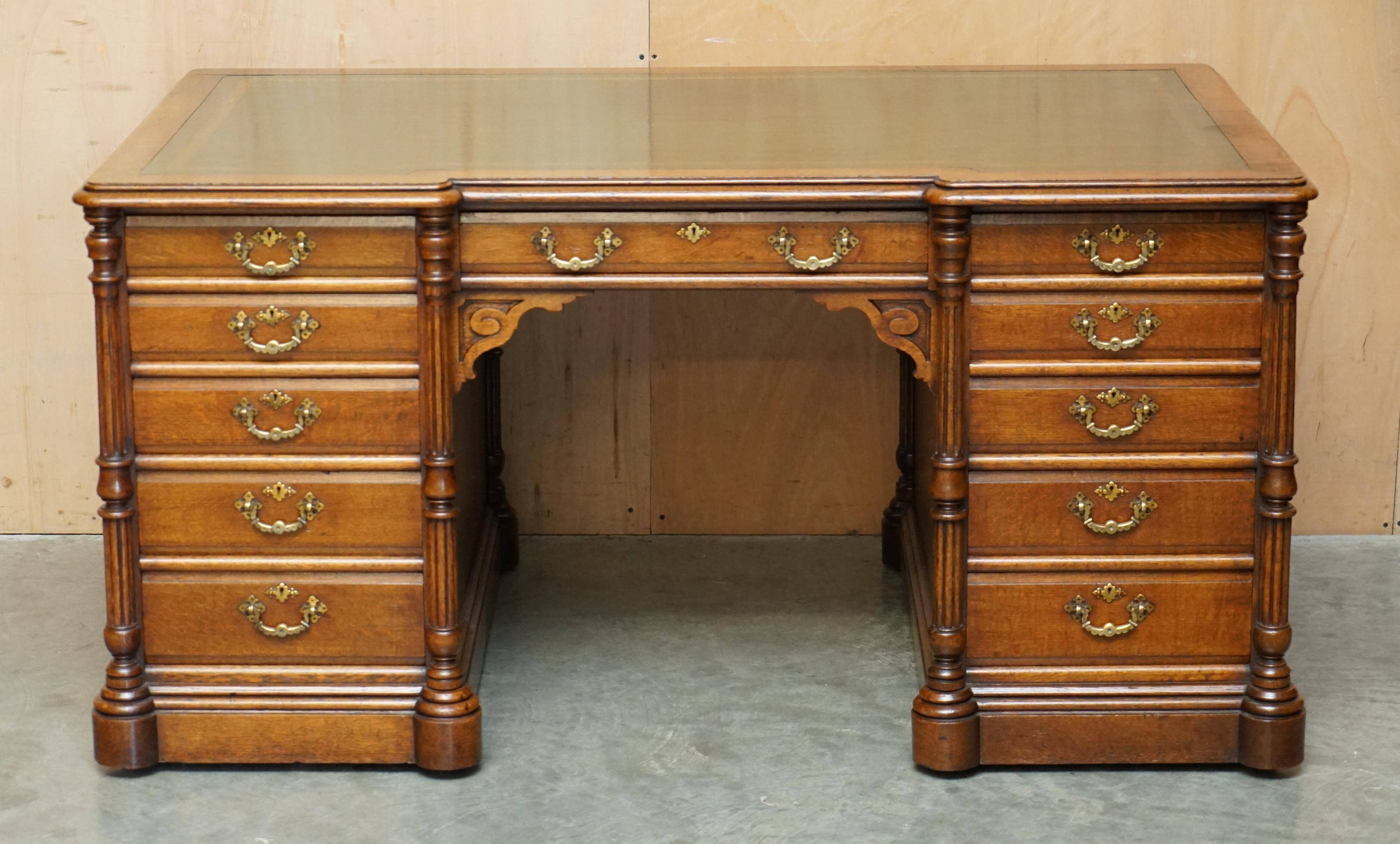 Antique double-sided desk C Hindley & Son in oak and leather
