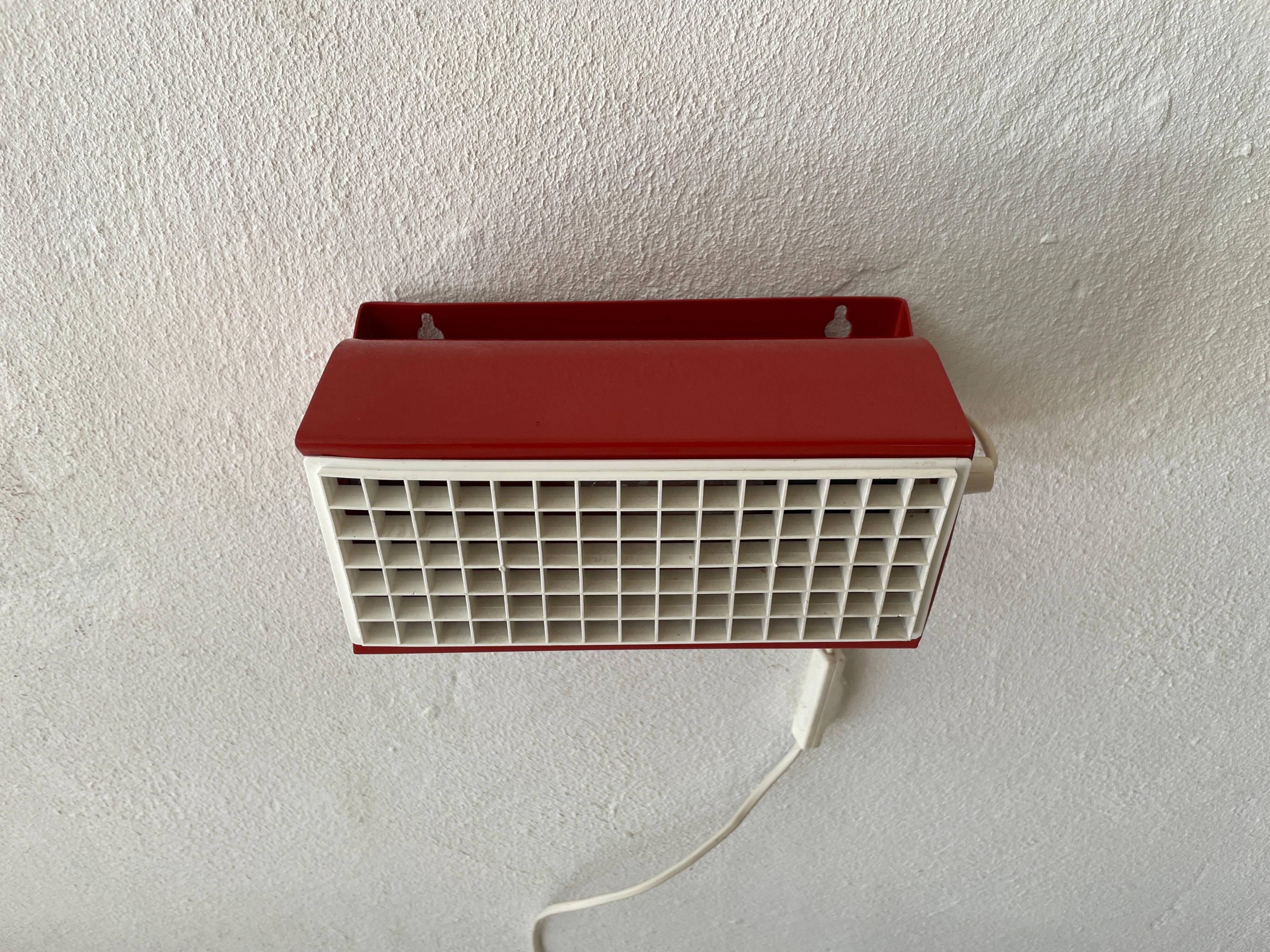 Simple red metal wall light from the AGE, 1970s, Germany.