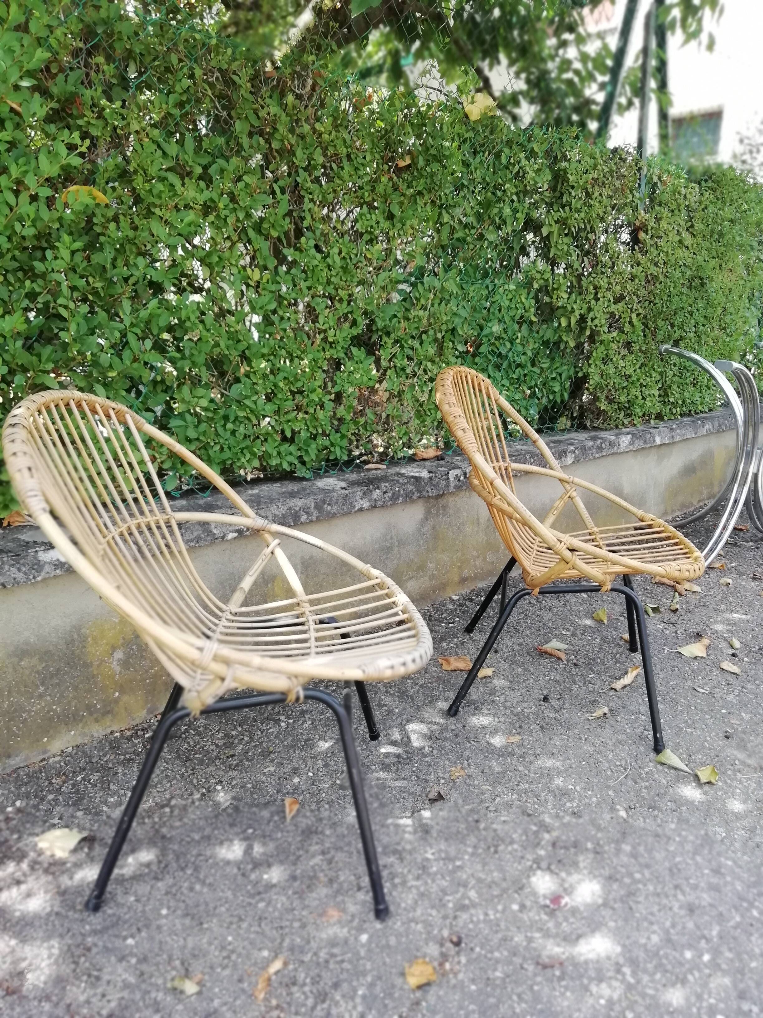 2 Rattan shell armchairs and metal legs