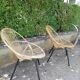 2 Rattan shell armchairs and metal legs