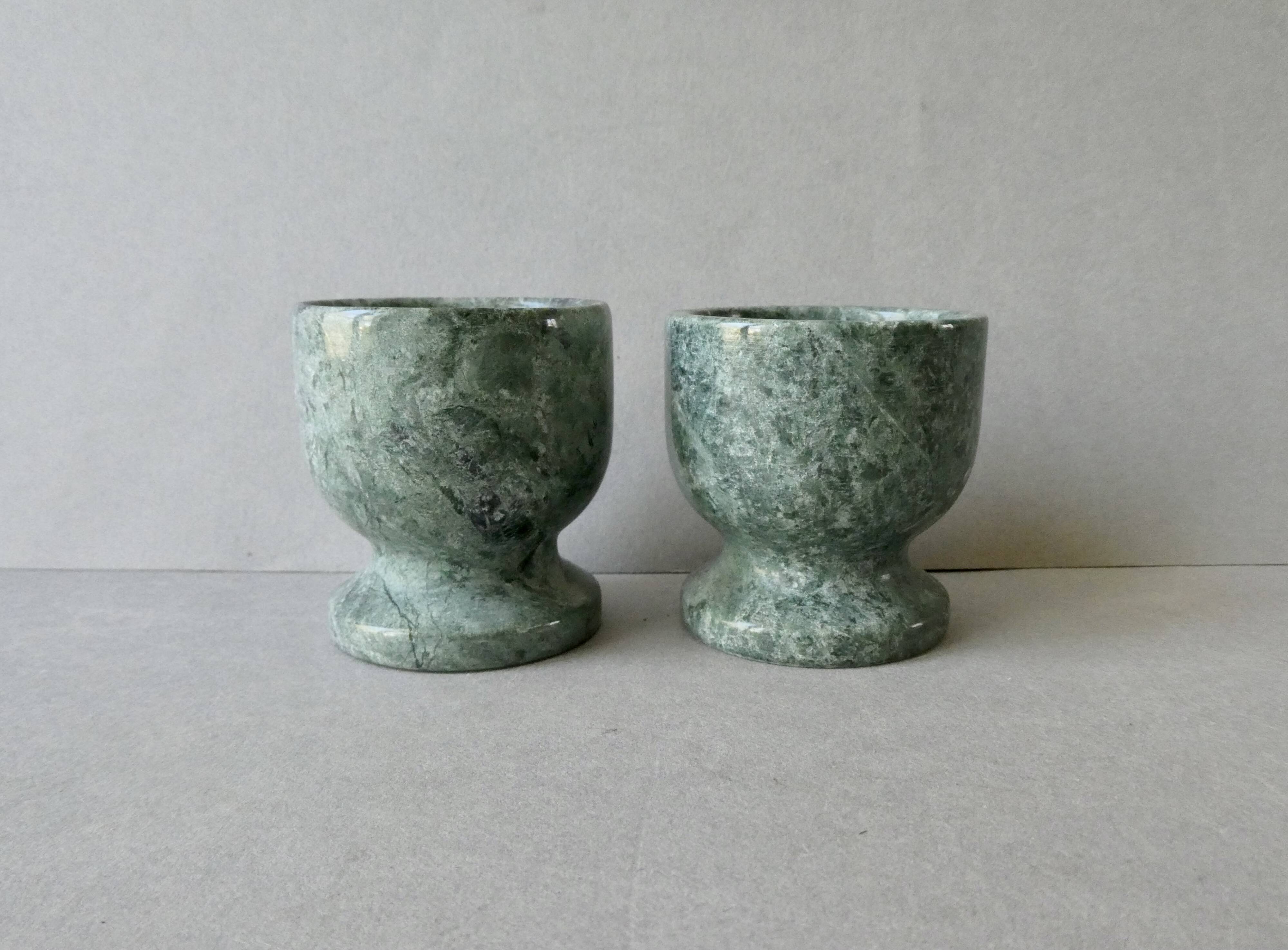 2 marble egg cups in veined white and green, circa 1980.