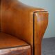 Set de 2 fauteuils Art Déco en cuir de mouton passepoil noir