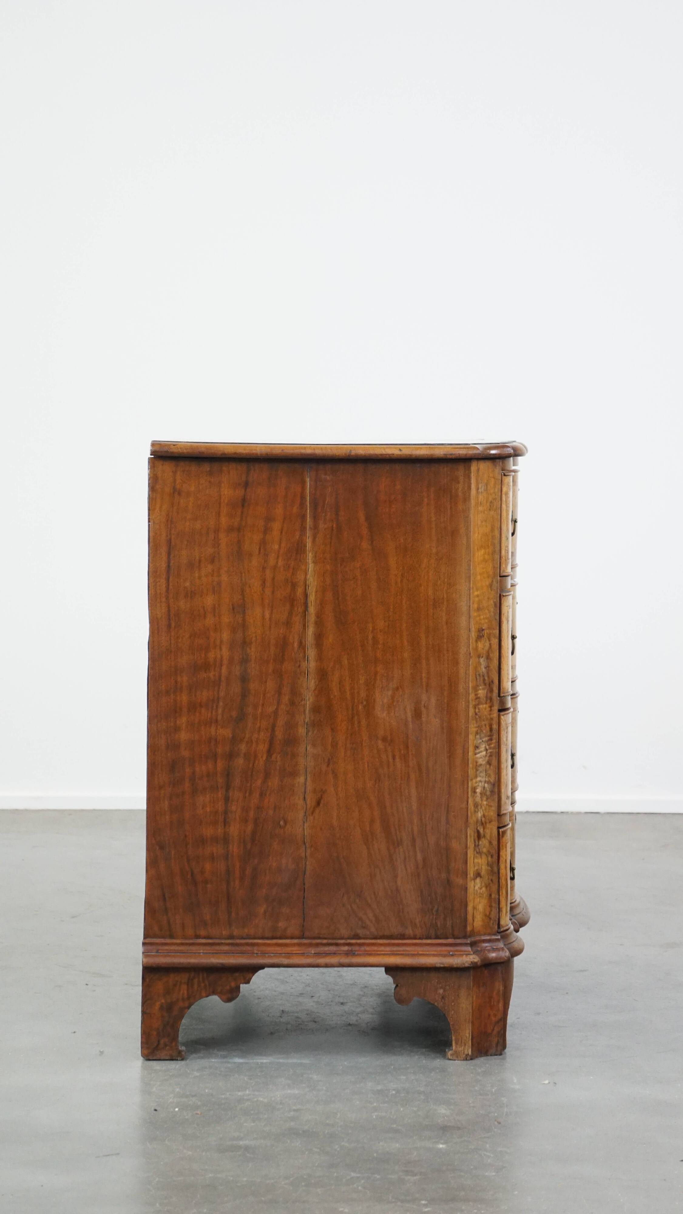 Baroque organ-bent walnut antique chest of drawers from the 18th century