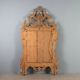 Antique gilded wooden mirror with rococo patterns, Italy, 18th century.