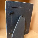 Enamelled ceramic frame