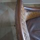 Woven rattan armchair and exotic wood in colonial style, 1980s.