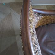 Woven rattan armchair and exotic wood in colonial style, 1980s.