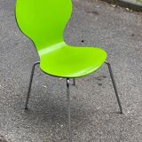 Fluorescent green Scandinavian chair in curved wood and steel