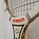 Vintage tennis racket with wooden press