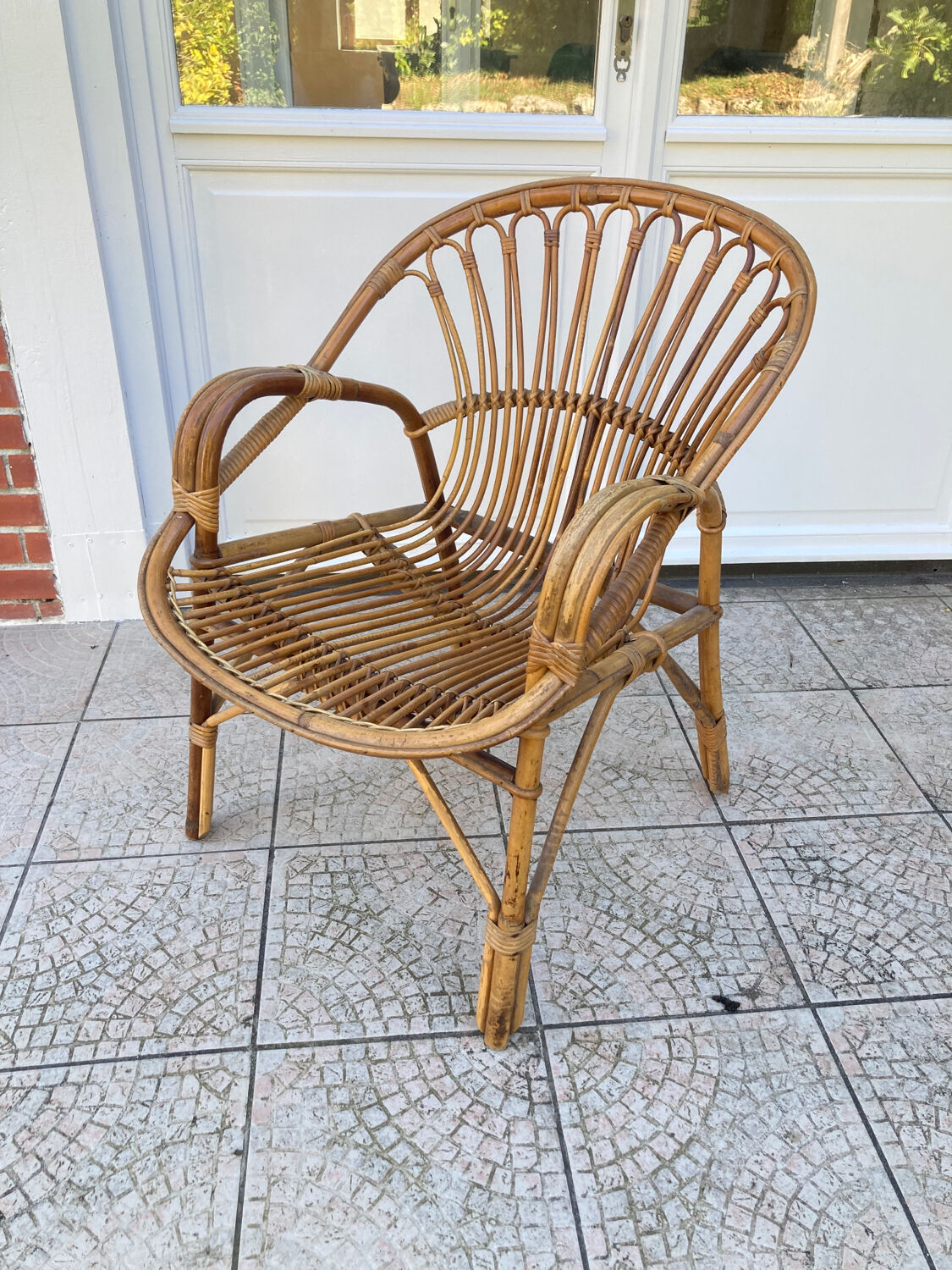 Vintage shell rattan armchair