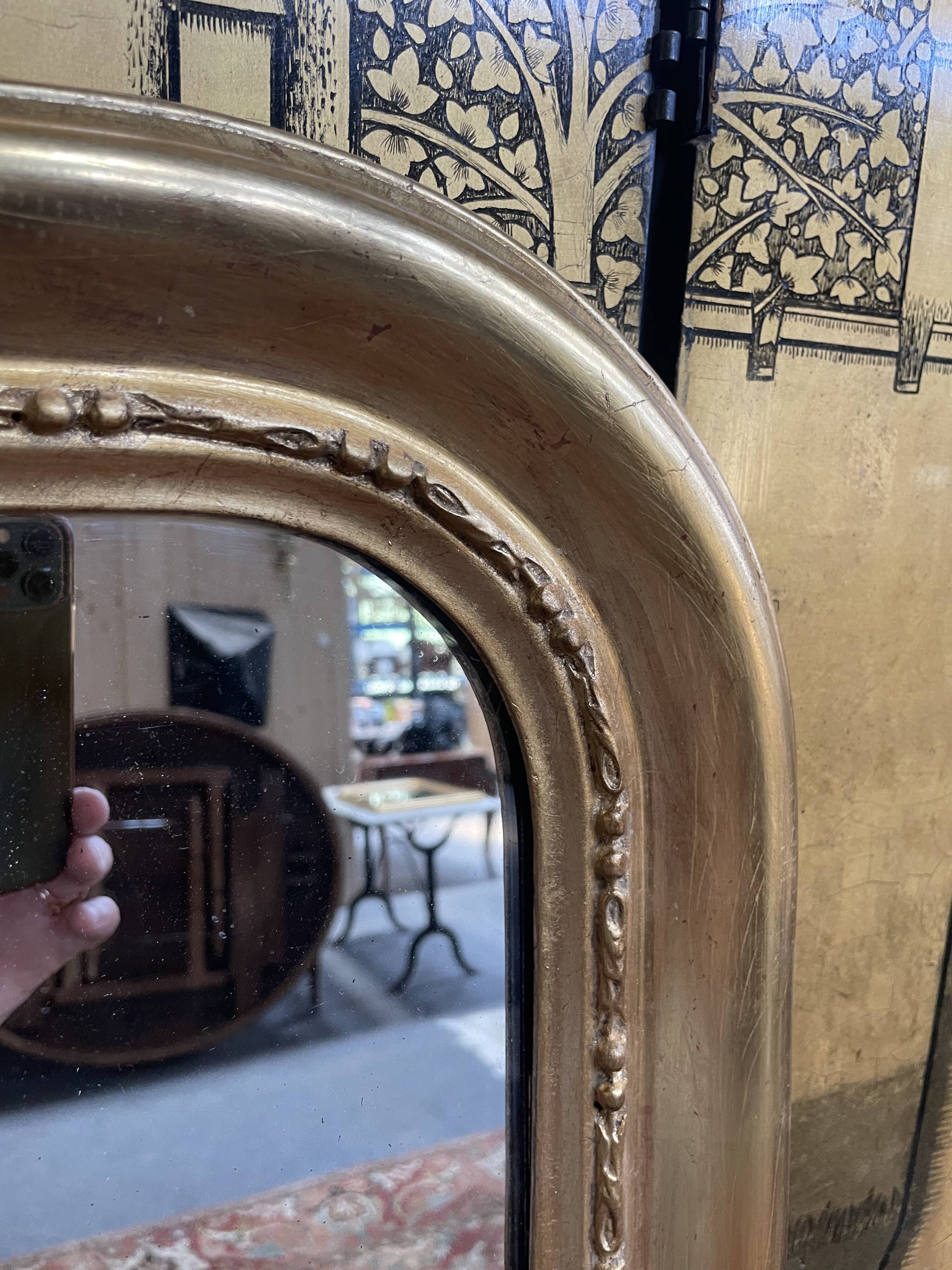 Louis Philippe era mirror with restored gold leaf