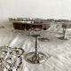 Vintage stainless steel cups on foot