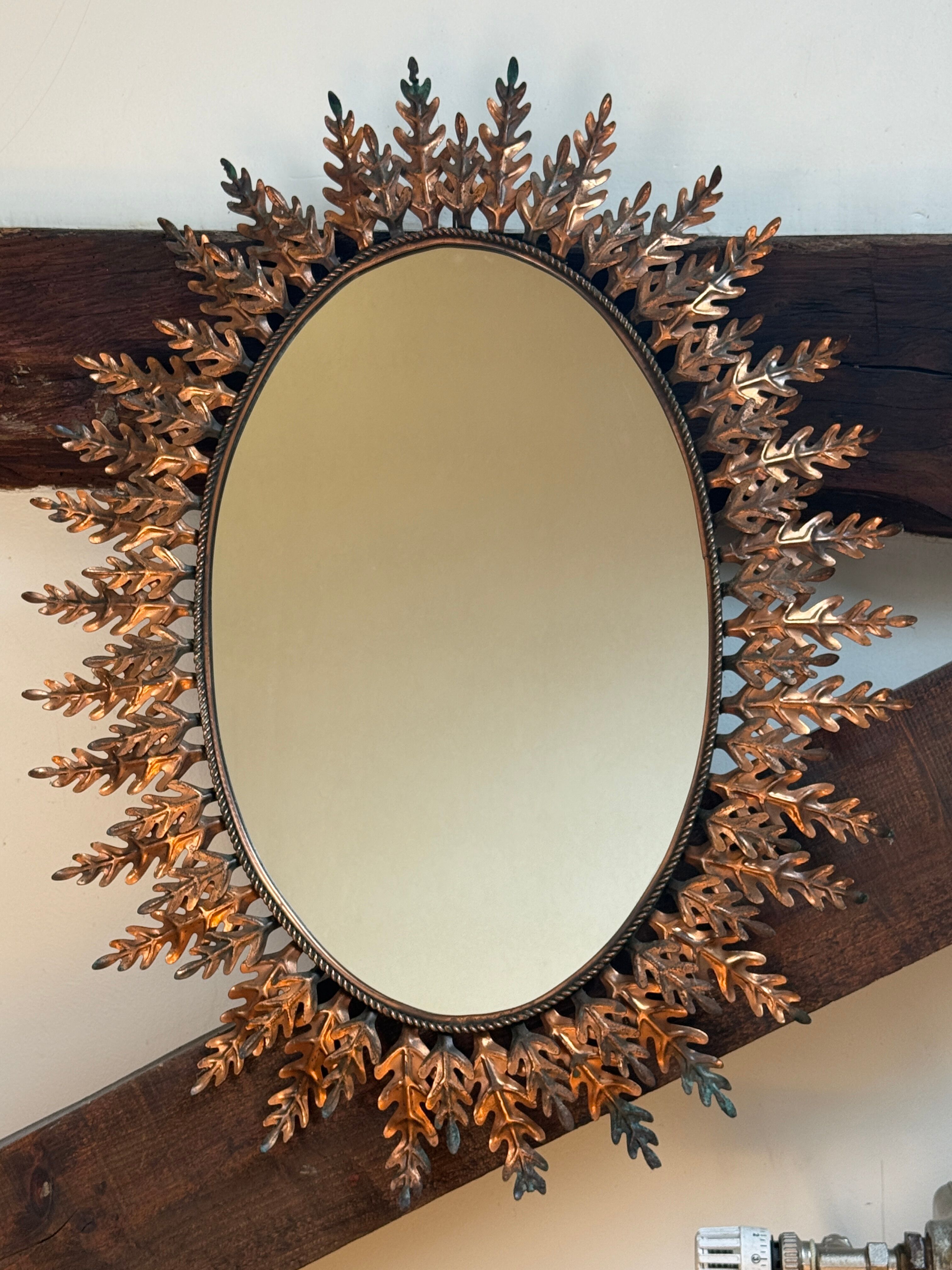 Oval sun mirror wrought iron from the 1950s Italy