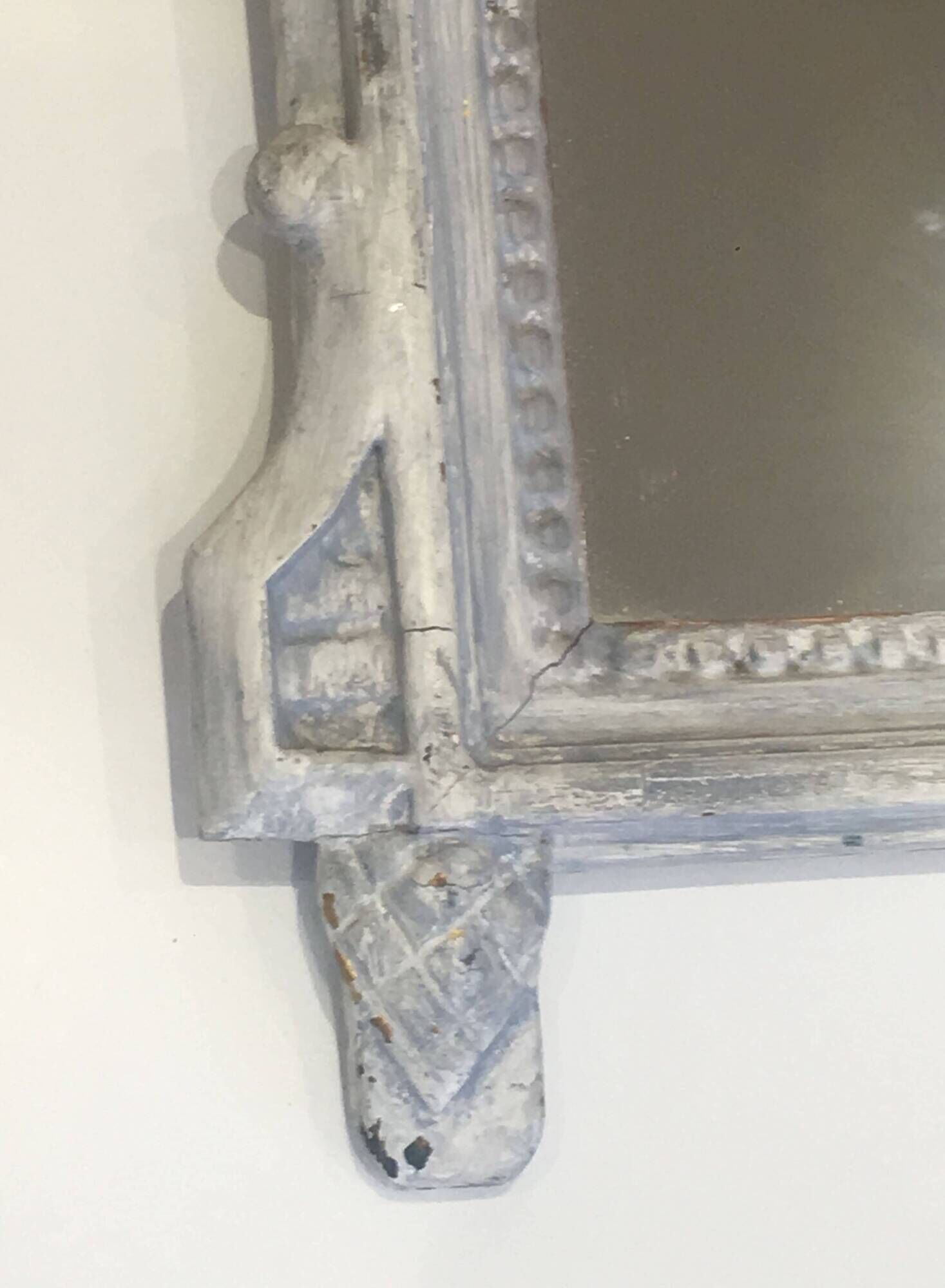 Louis XVI Style Mirror in Carved Wood with Grey Patina and Dove Pediment