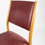 Suite of six chairs in oak and leather