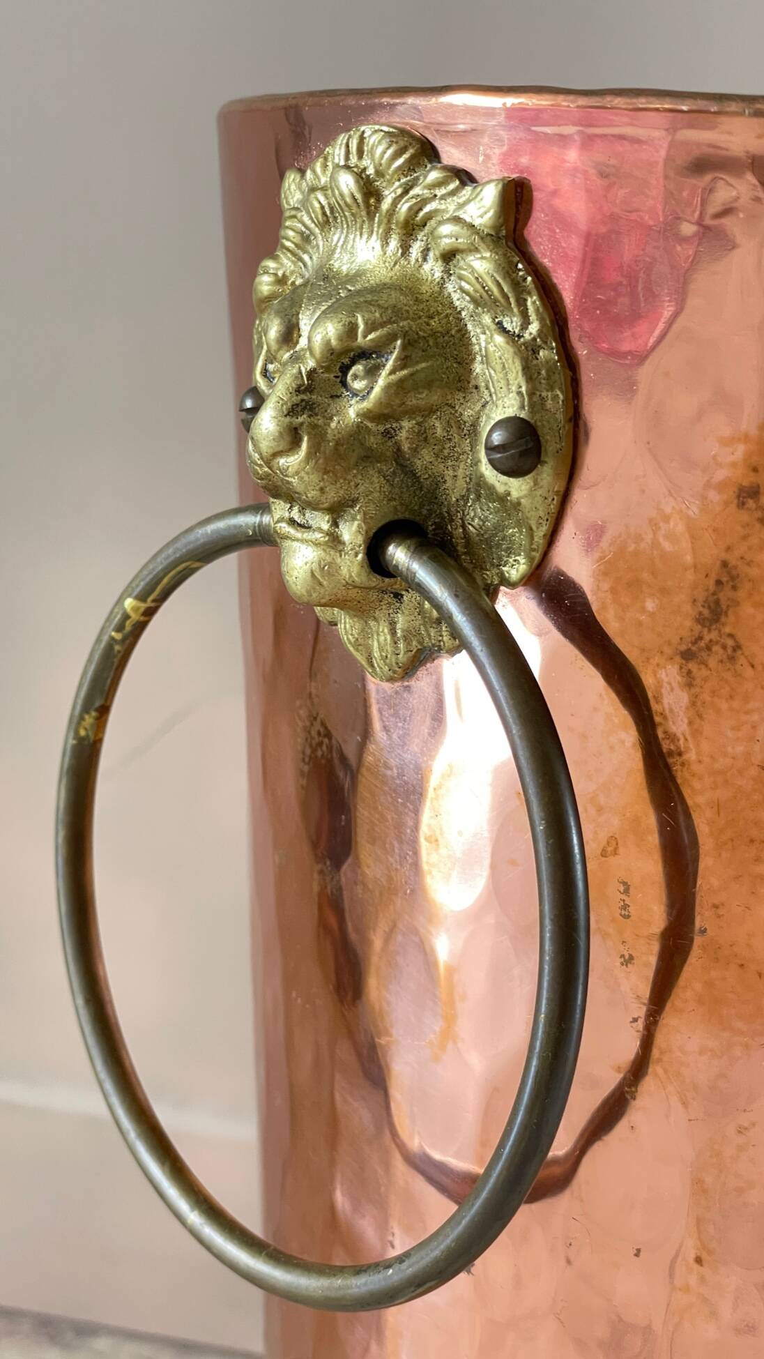 Vintage copper lion's head umbrella holder