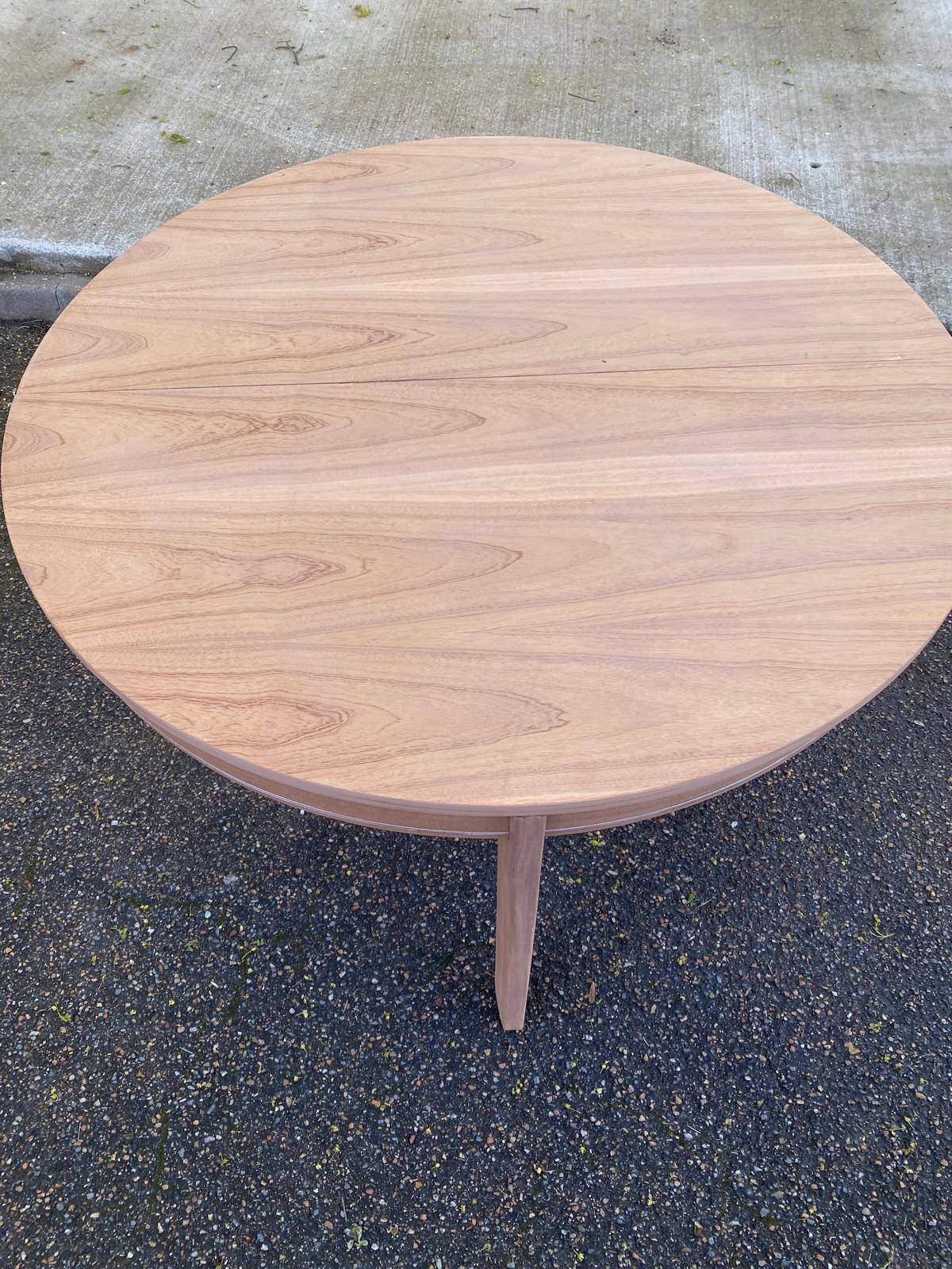 Renovated round extendable Scandinavian dining table in teak, 153cm.