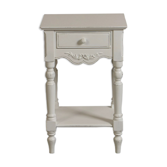 White bedside table