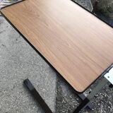 Extendable vintage desk from the 1960s, brown wood and metal structure, practical mid-century design.