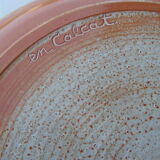 Round dish in gres a decor of leaves sign in calcat