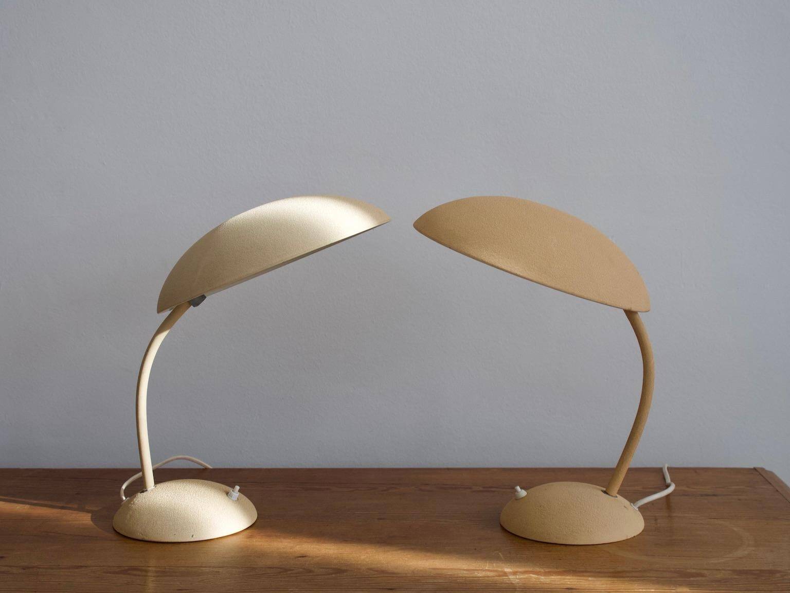 Pair of painted beige metal table lamps, 1930s