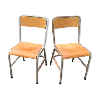 Vintage modernist schoolboy chairs with tubular metal base.