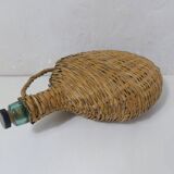 old bottle dressed in rattan vintage pilgrim gourd