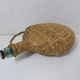 old bottle dressed in rattan vintage pilgrim gourd