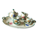 Small antique tea set in porcelain for children.