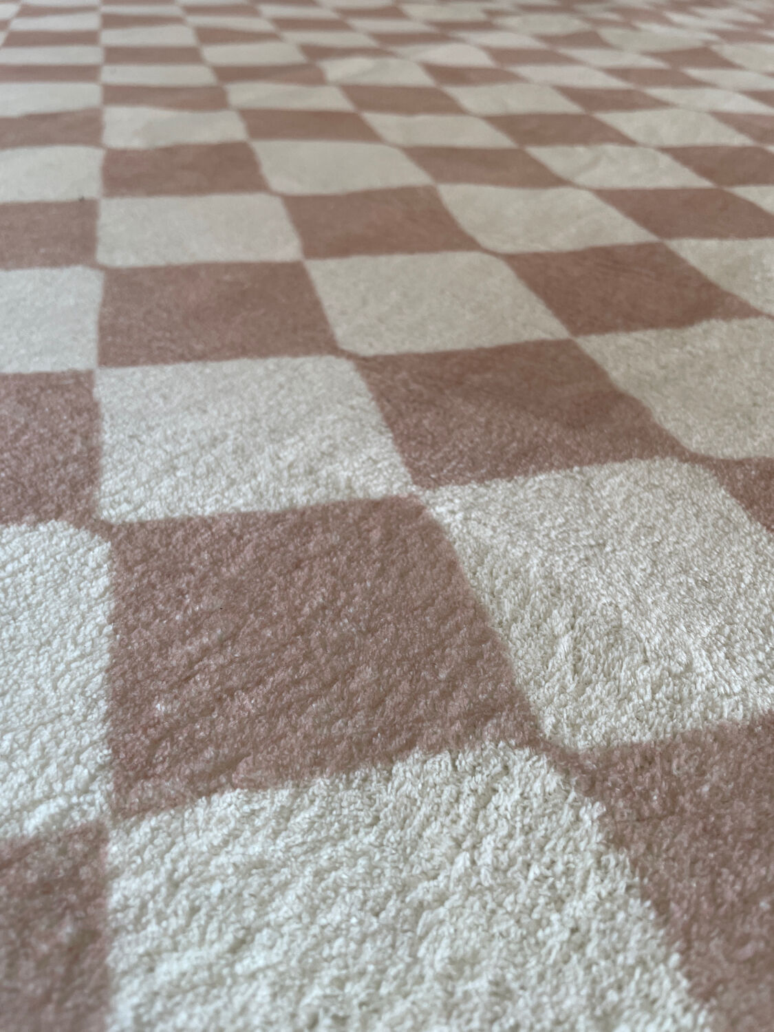 Beige checkerboard rug