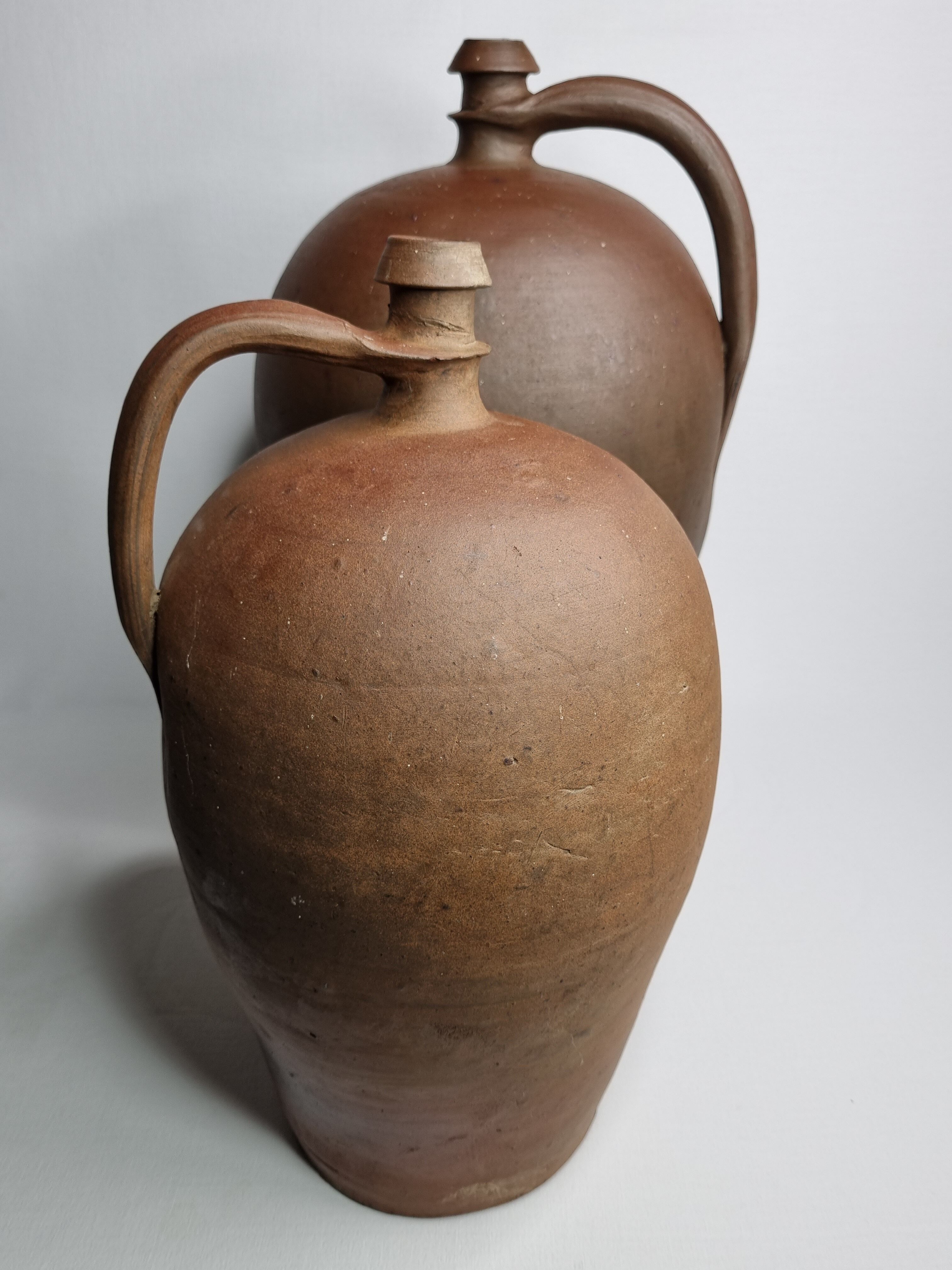 Pair of terracotta ladies-jeannes, 44 cm