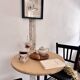 Cast iron base side table with a stone-effect top.