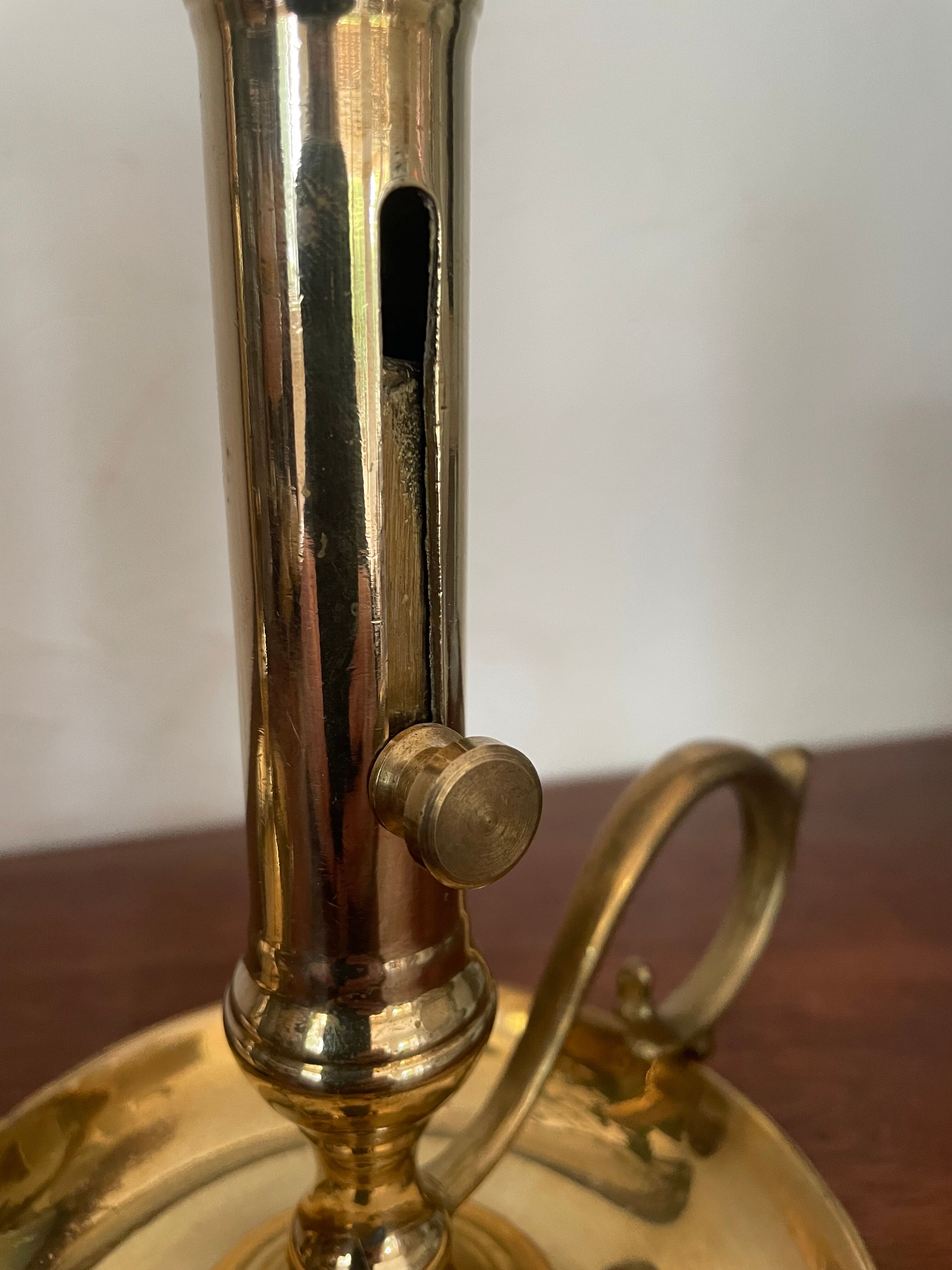 Pair of brass candle holders