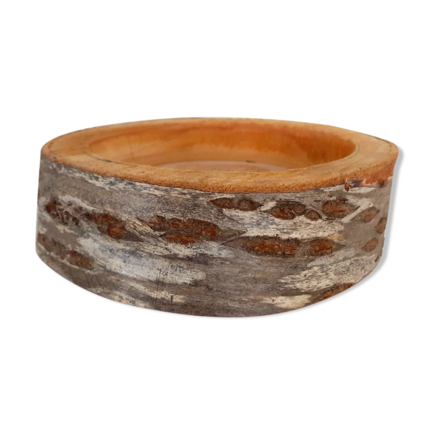 Empty raw wooden pocket with bark