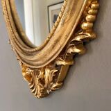 Oval gilded mirror baroque style