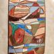 Isaac Lane Muse, brass and enamel plaque.