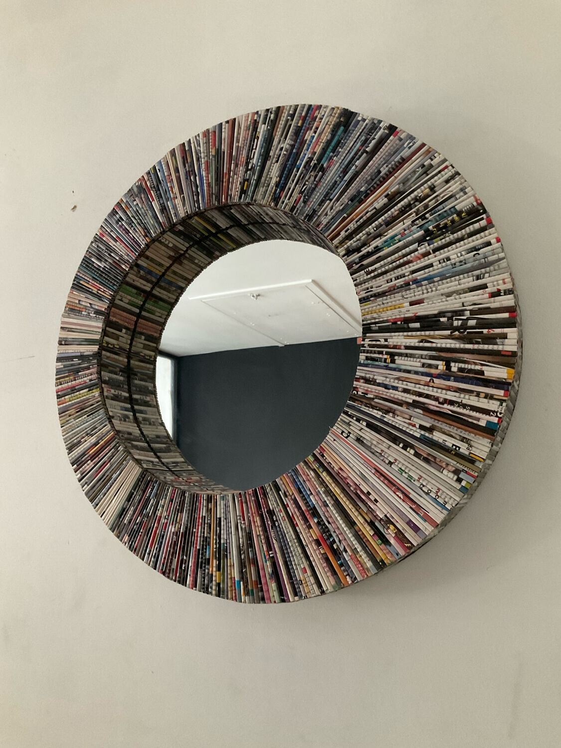 Vintage round mirror made of paper rolls